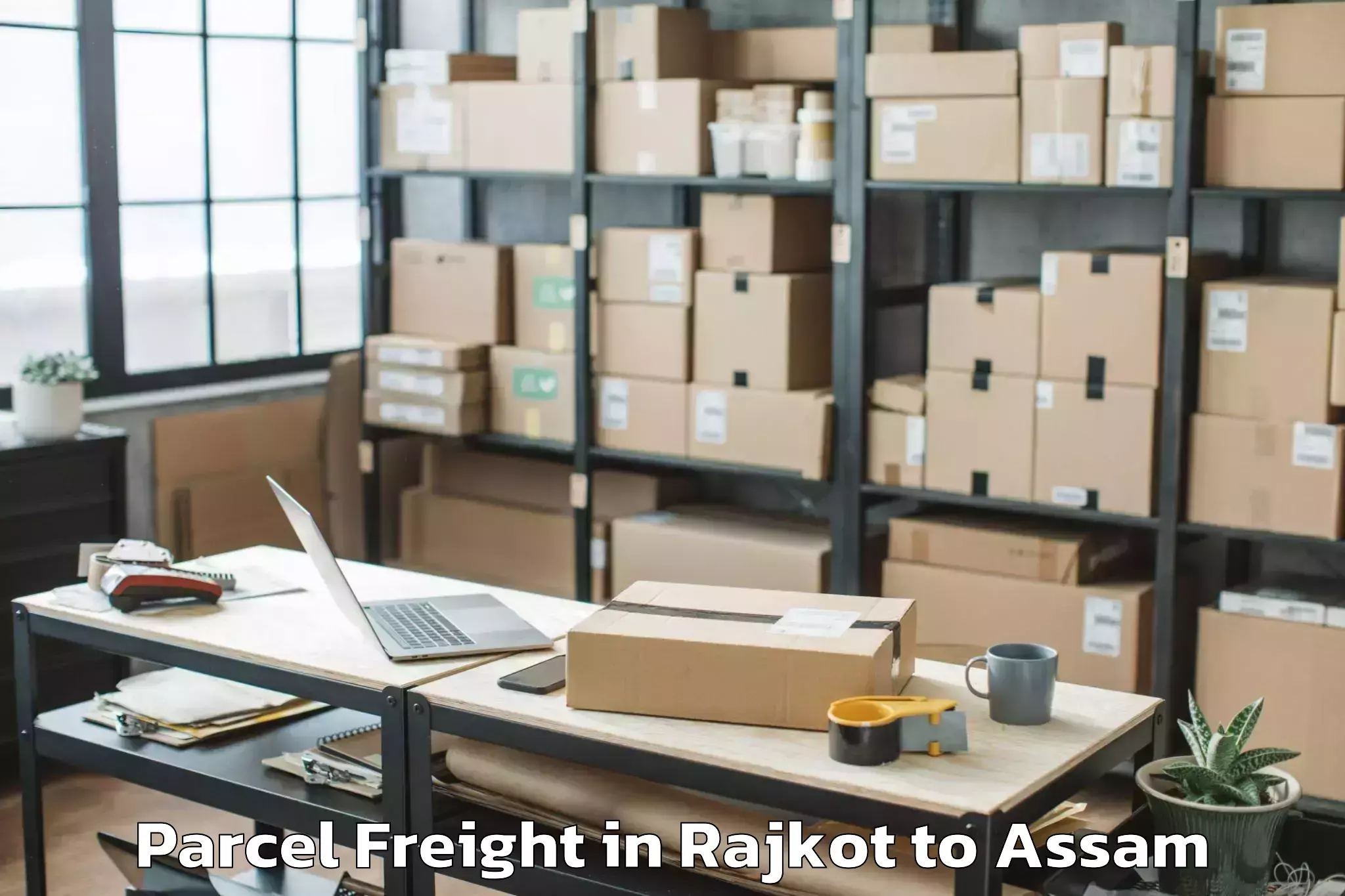 Discover Rajkot to Doom Dooma Parcel Freight